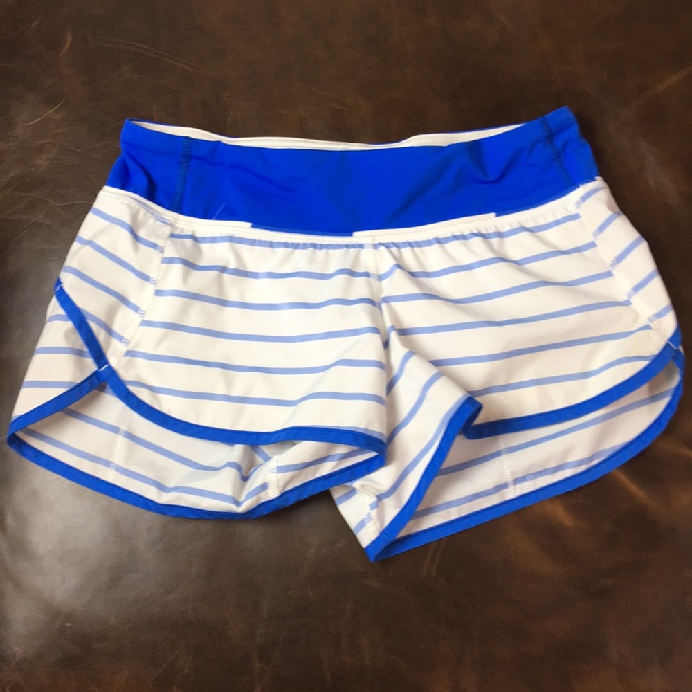 Lulu lemon; white shorts with blue stripes.